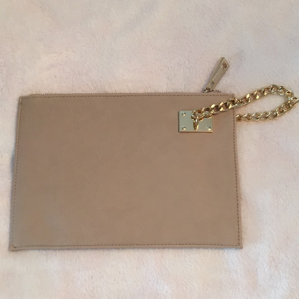 SR squared by Sondra Robert’s faux leather clutch or wristlet